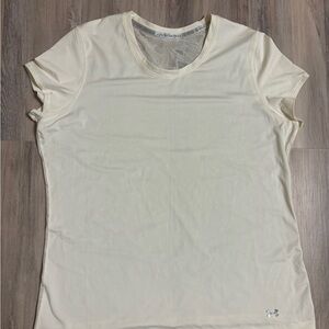 Women’s White Under Armour Athletic short sleeve fits like a M/L sheer back